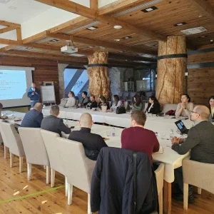People sitting around the table for a meeting